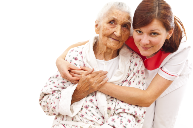 caregiver and elder patient smiling